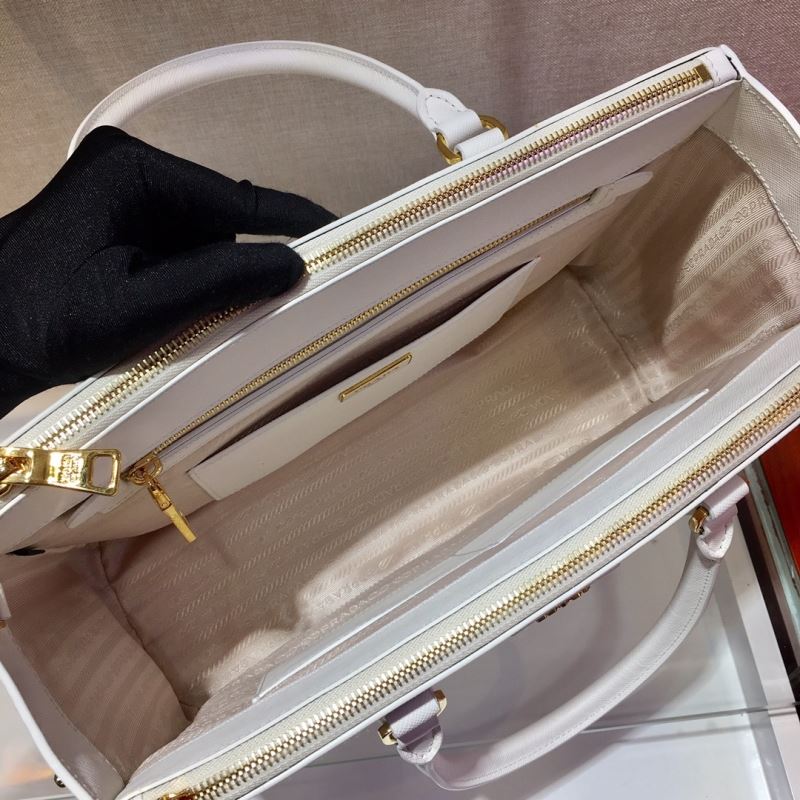 Pra*a top handle bags